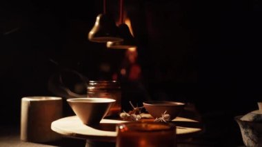 Brewing puerh tea. Traditional chinese tea ceremony. Tea pouring to teapot on a tea tray