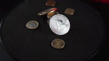 Bitcoin BTC coin rotating on a black background