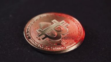 Bitcoin BTC coin rotating on a black background
