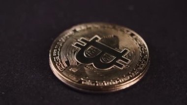 Bitcoin BTC coin rotating on a black background