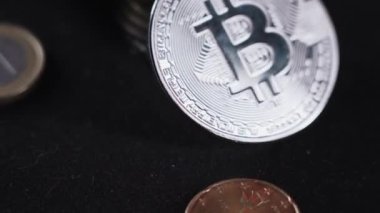 Bitcoin BTC coin rotating on a black background