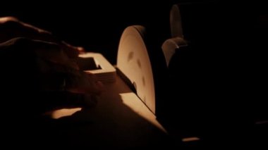 carpenter sanding wood board on a grinding machine 4k