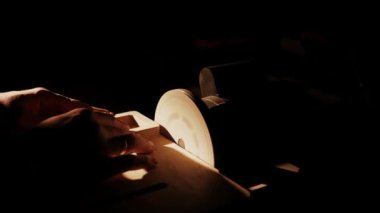 carpenter sanding wood board on a grinding machine 4k