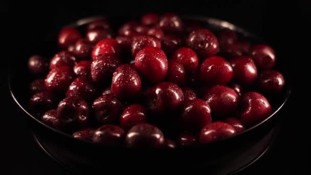 Red Ripe Cherries Covered Water Droplets Spinning Black Background Wet — Stock Video