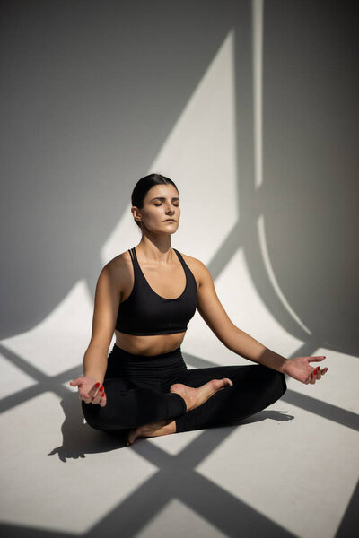 Woman doing yoga exercises.Yoga and fitness concept