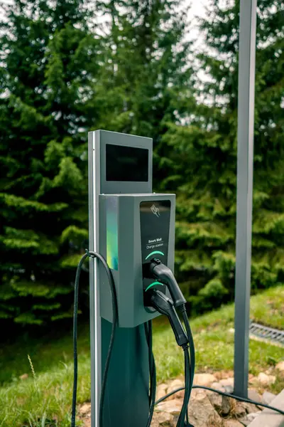 stock image Charging station for electric cars near the forest. Green energy concept. Charging for cars