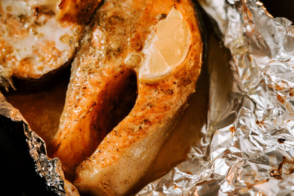 Grilled trout steak with lemon