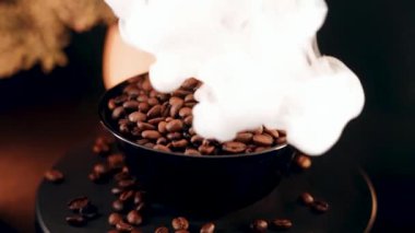 Close-up view of rotating coffee beans showcasing rich texture on a black background in high resolution