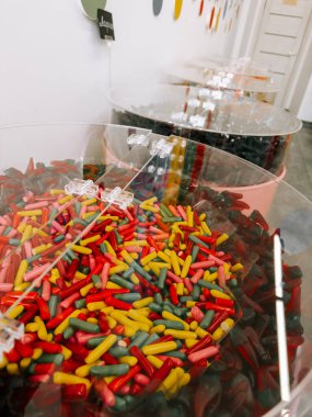 Colorful candy display featuring vibrant gummy treats in a store setting