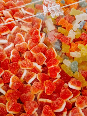 Colorful jelly dessert with layers of meat presented in a unique display