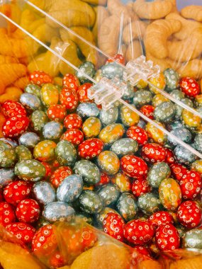 Colorful candy display featuring vibrant gummy treats in a store setting