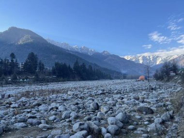 Rocky sea near mountains