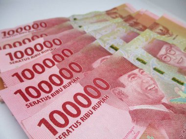 pile of Indonesian rupiah banknotes with the theme of the financial crisis