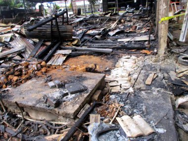 a condition of a building that has been completely burnt by fire