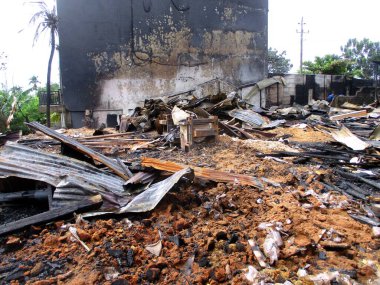 a condition of a building that has been completely burnt by fire