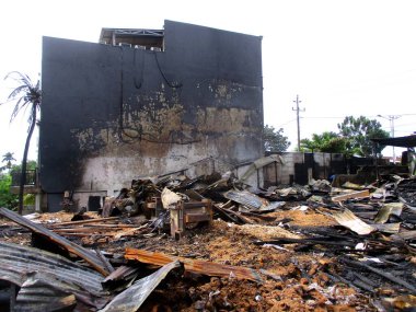 a condition of a building that has been completely burnt by fire