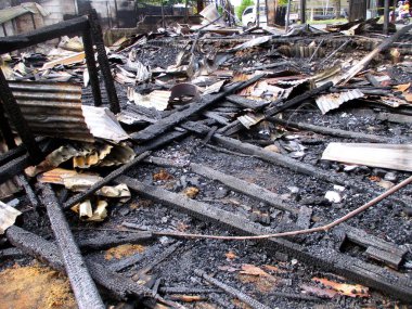 a condition of a building that has been completely burnt by fire