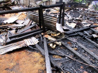 a condition of a building that has been completely burnt by fire