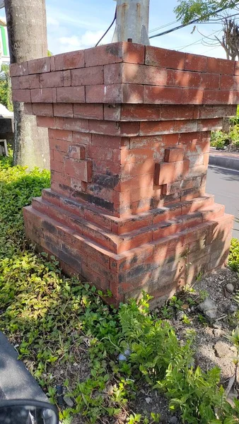 pile foundation with classic red brick finish.