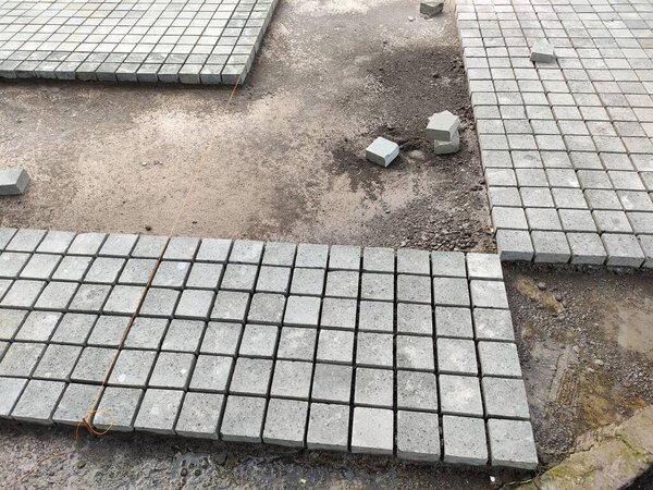 монтаж булыжника на открытых площадках.