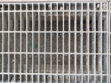 drain gutter with cast iron grill cover.