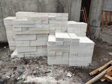 lightweight brick piles on a building project. ready for building walls.