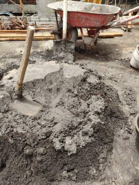 mixture of cement, sand and water, mixed manually using a hoe. ready for plastering the walls of the building.