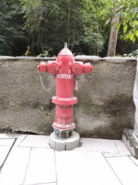 Hydrant pillar in the outside area, for fire fighting. Bali - Indonesia ; December 17, 2022.