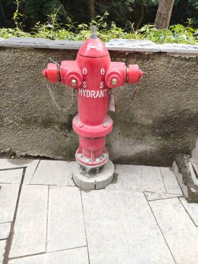 Hydrant pillar in the outside area, for fire fighting. Bali - Indonesia ; December 17, 2022.