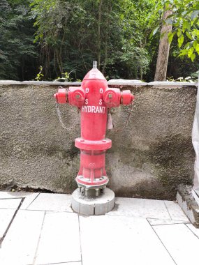 Hydrant pillar in the outside area, for fire fighting. Bali - Indonesia ; December 17, 2022.