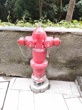 Hydrant pillar in the outside area, for fire fighting. Bali - Indonesia ; December 17, 2022.