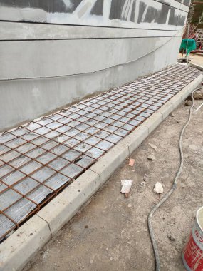 installation of sheet plastic and wire mesh, for external flooring. ready to be poured concrete.