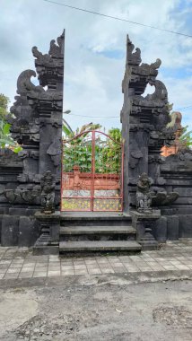 the gate of the temple entrance, a Balinese Hindu cultural building. Bali - Indonesia ; January 4, 2023.