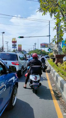 traffic jam on the bypass i gusti ngurah rai road. Bali - Indonesia ; January 1, 2023.
