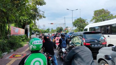 traffic jam on the bypass i gusti ngurah rai road. Bali - Indonesia ; January 1, 2023.