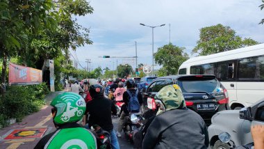 traffic jam on the bypass i gusti ngurah rai road. Bali - Indonesia ; January 1, 2023.