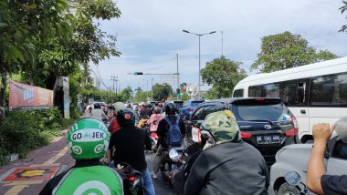 traffic jam on the bypass i gusti ngurah rai road. Bali - Indonesia ; January 1, 2023.