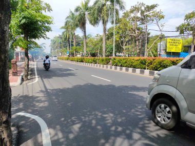 the traffic on the street was light, after last night's new years event. Bali - Indonesia ; January 1, 2023.