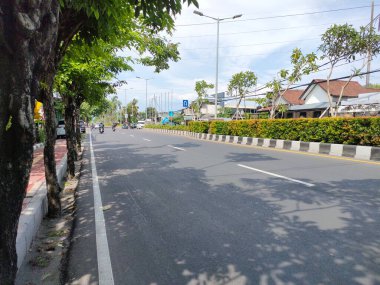 the traffic on the street was light, after last night's new years event. Bali - Indonesia ; January 1, 2023.