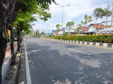 the traffic on the street was light, after last night's new years event. Bali - Indonesia ; January 1, 2023.