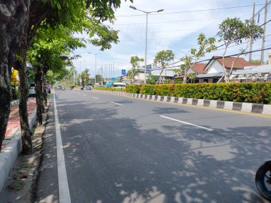 the traffic on the street was light, after last night's new years event. Bali - Indonesia ; January 1, 2023.