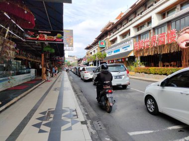 traffic jam on kartika plaza road towards kuta beach. Bali - Indonesia ; January 1, 2023.