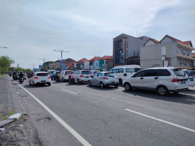 traffic jam on I gusti ngurah rai road during holidays. Bali - Indonesia ; January 1, 2023.