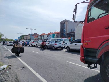 traffic jam on I gusti ngurah rai road during holidays. Bali - Indonesia ; January 1, 2023.