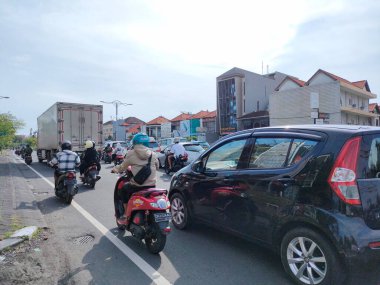 traffic jam on I gusti ngurah rai road during holidays. Bali - Indonesia ; January 1, 2023.