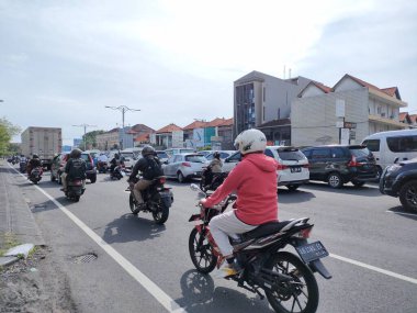 traffic jam on I gusti ngurah rai road during holidays. Bali - Indonesia ; January 1, 2023.