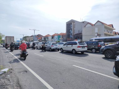 traffic jam on I gusti ngurah rai road during holidays. Bali - Indonesia ; January 1, 2023.