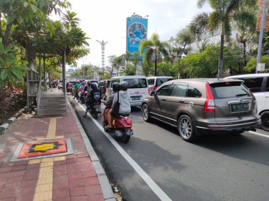 traffic jam on I gusti ngurah rai road during holidays. Bali - Indonesia ; January 1, 2023.
