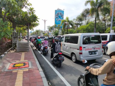 traffic jam on I gusti ngurah rai road during holidays. Bali - Indonesia ; January 1, 2023.