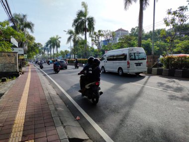 the traffic on the street was light, after last night's new years event. Bali - Indonesia ; January 1, 2023.